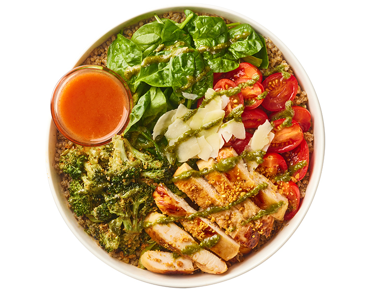 Freshii Chicken Pesto Parmesan bowl with grilled chicken, quinoa, spinach, grape tomatoes, broccoli, parmesan and pesto vinaigrette