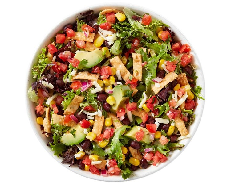 Fiesta Salad at Freshii restaurant in Sundance SE Calgary — mixed greens, grilled chicken, corn, black beans, avocado, chipotle dressing