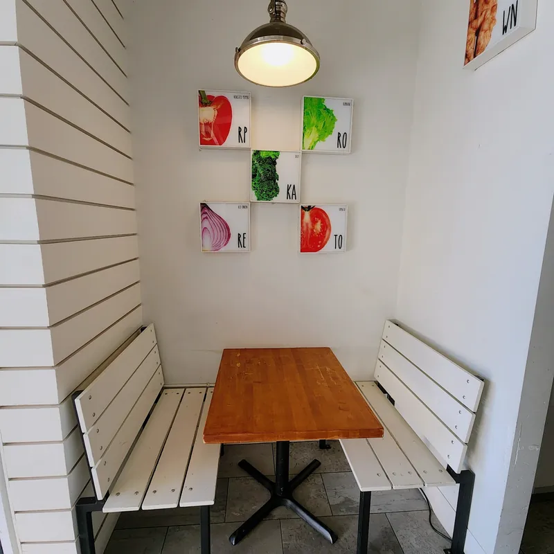 Booth table for families and small groups at Freshii Sundance restaurant in Sundance, SE Calgary.