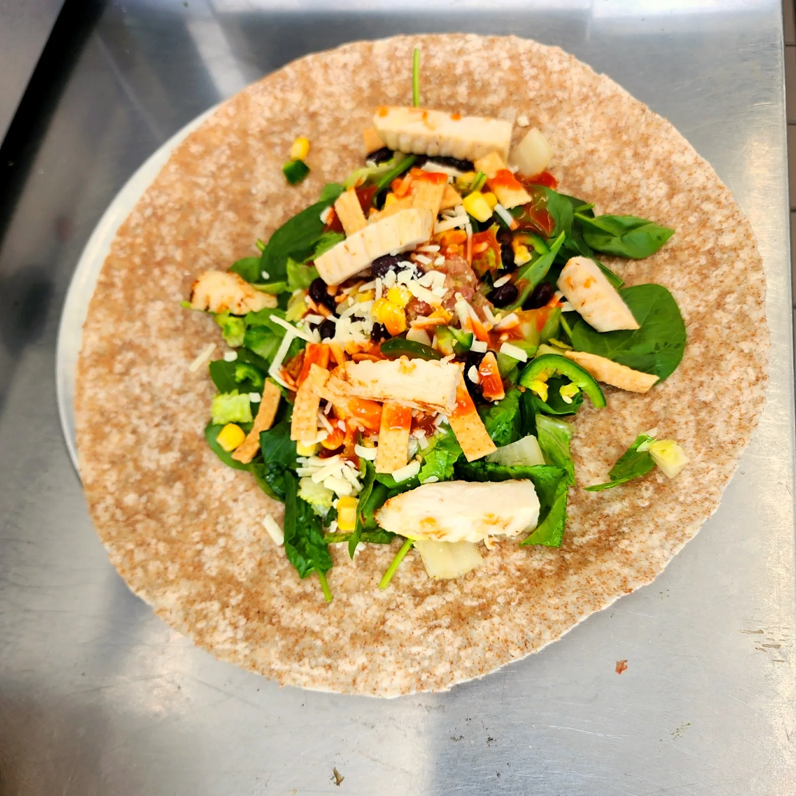 Freshii Sundance Fiiesta Wrap with chicken, greens, corn, black beans and jalapeño