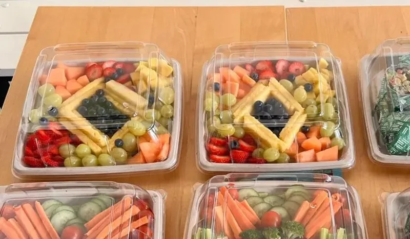 Fruit platters packed for a Freshii Sundance catering order