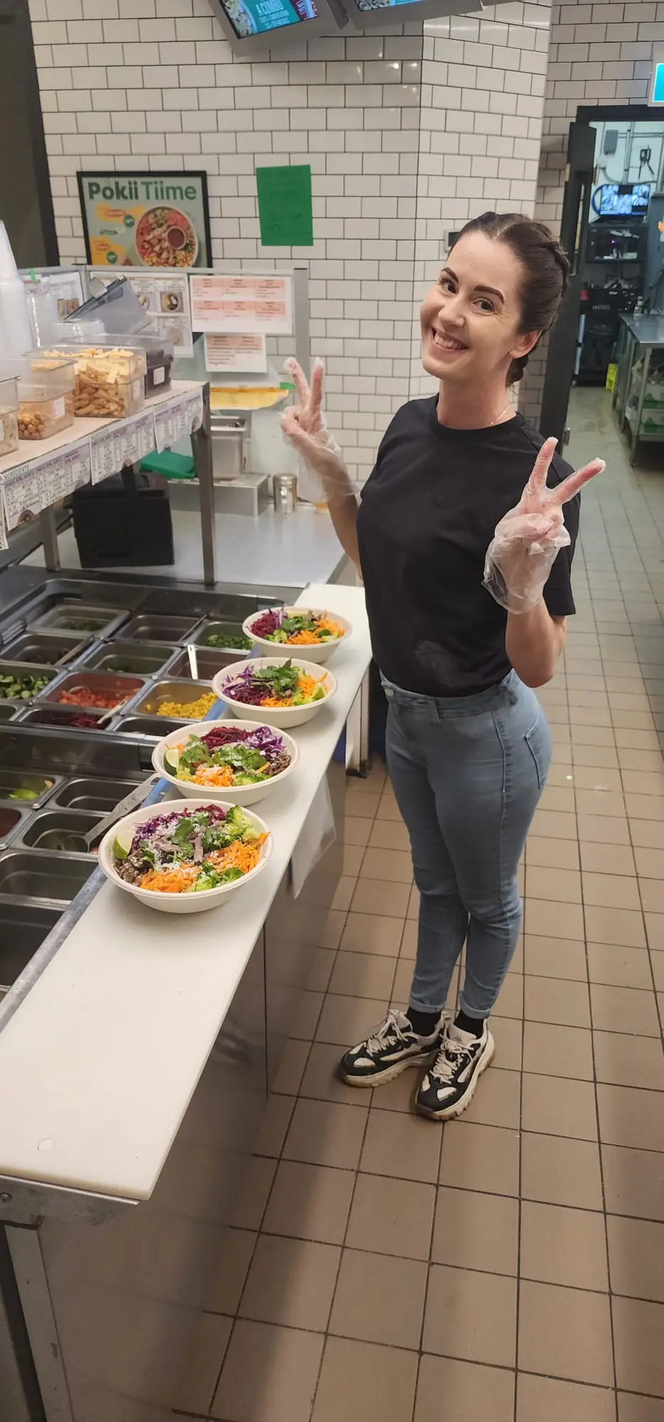 Freshii Sundance team member preparing bowls on the service line