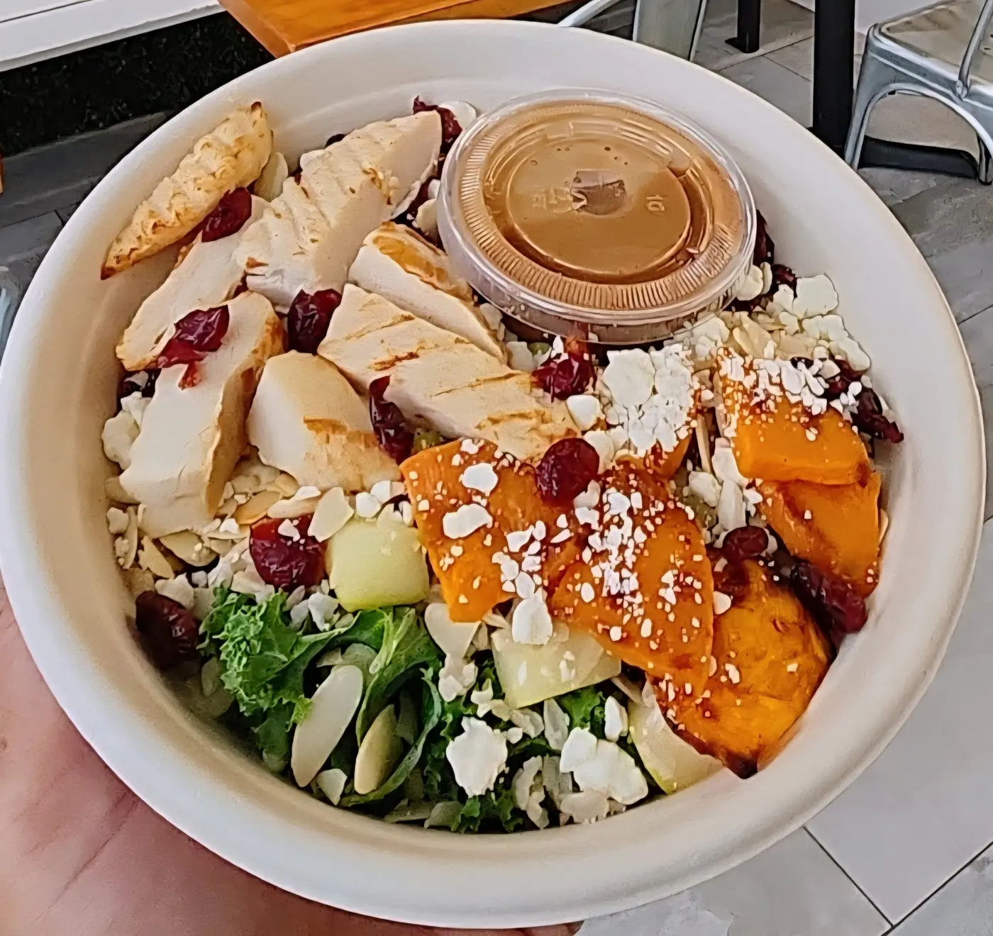 Freshii Harmony bowl with chicken, kale, sweet potato, feta, cranberries and almonds