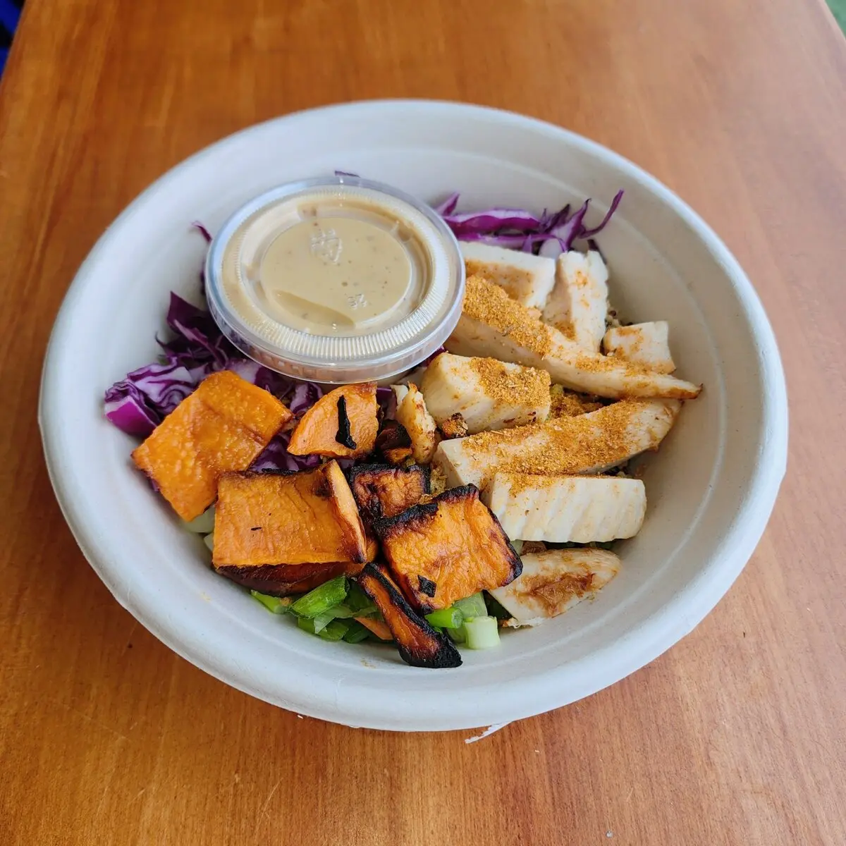 Freshii Hot Honey Mustard Chicken bowl with Cajun chicken, quinoa, sweet potato, red cabbage, crispy fried onions and hot honey mustard