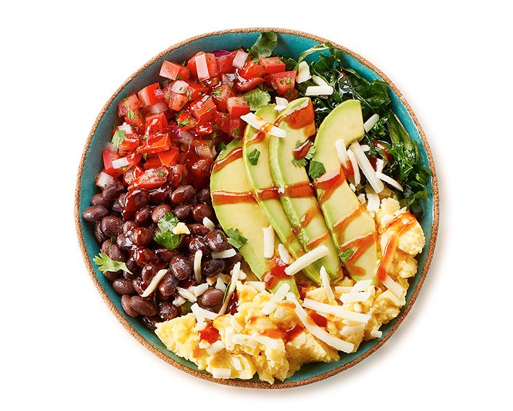Huevos Breakfast Bowl with cage-free eggs, rice, black beans, salsa, and avocado at Freshii Sundance